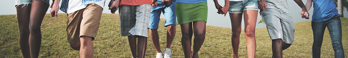 A group of people walking together in a park